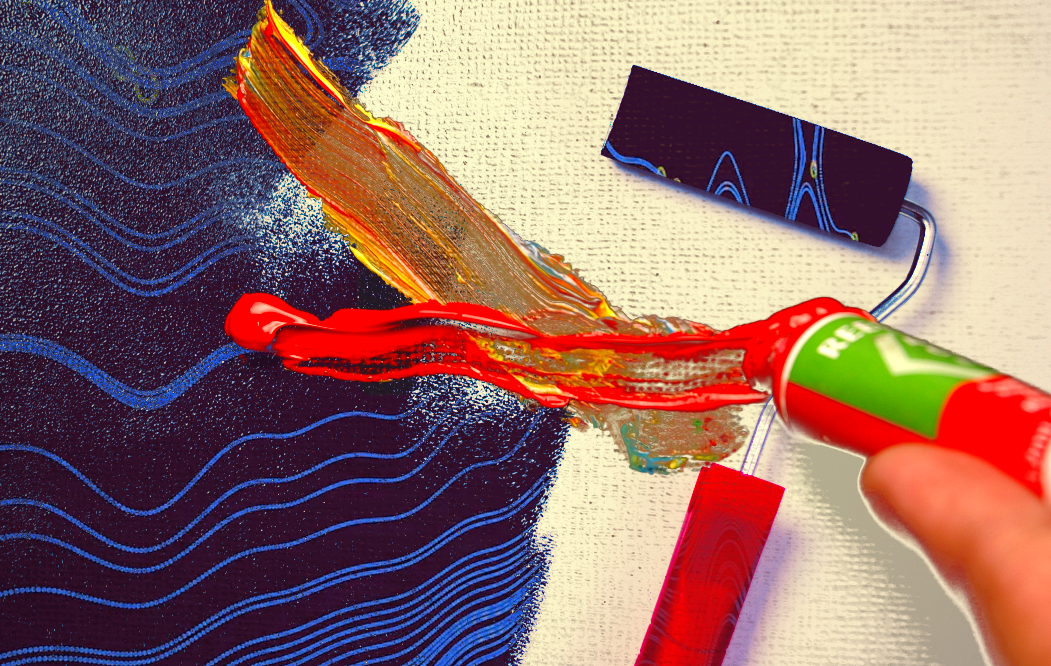 a painter squeezes paint out