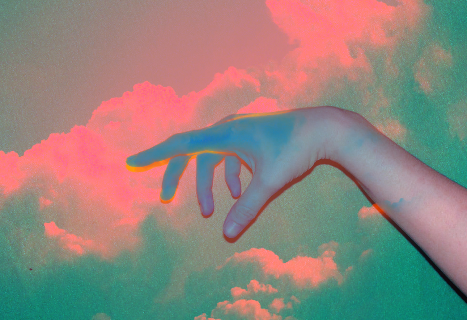 une main et le ciel 