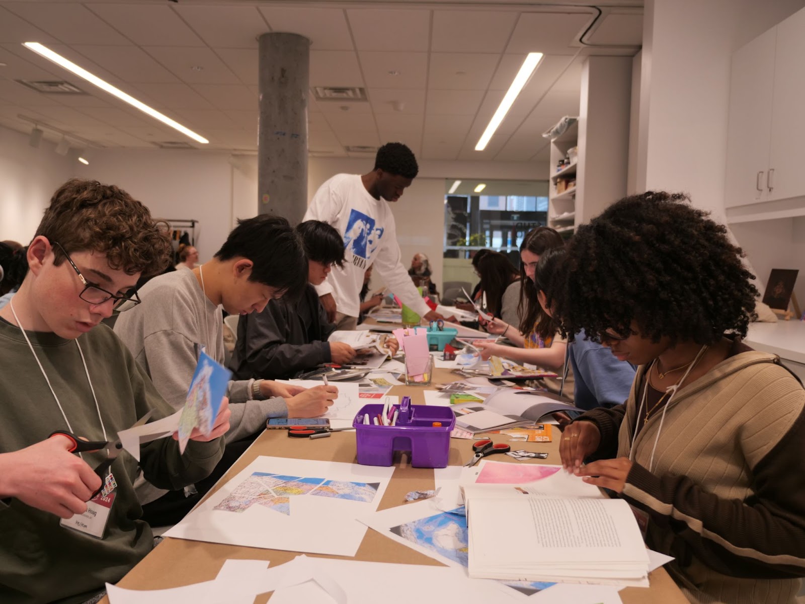 Students work with collage during the “Remapping Place” workshop at the Ottawa Art Gallery.