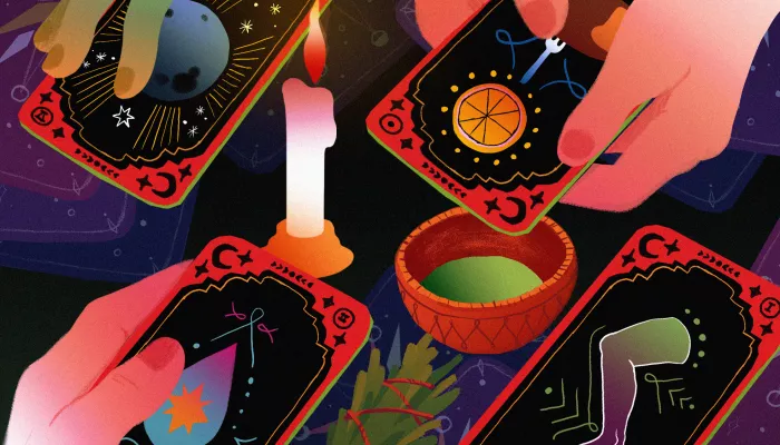 tarot cards are exchanged over a candle