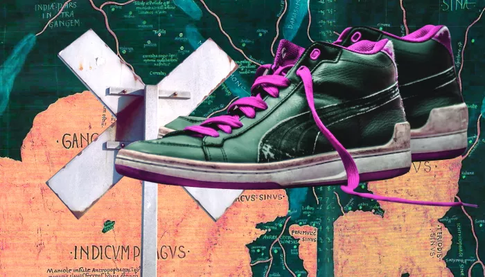 a pair of sneakers over a map