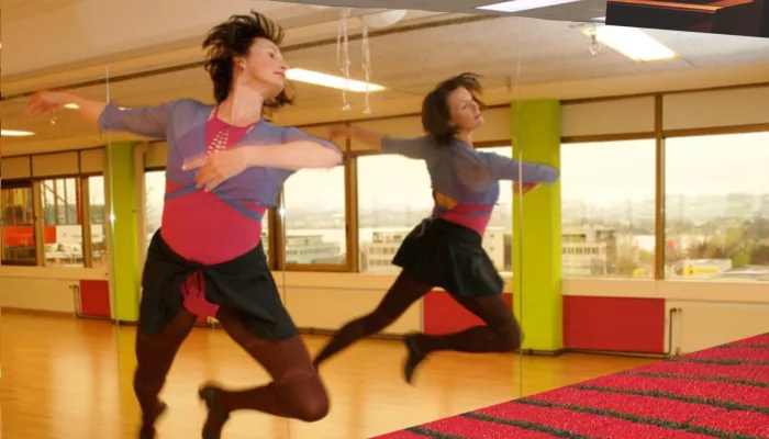 Two women dancing in parellel