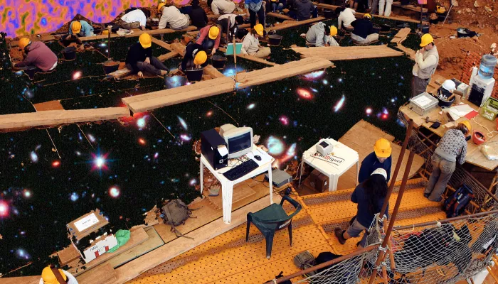 workers dissemble an office to show outerspace